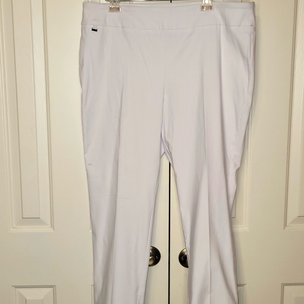 Nine.Eight white slacks, size 18